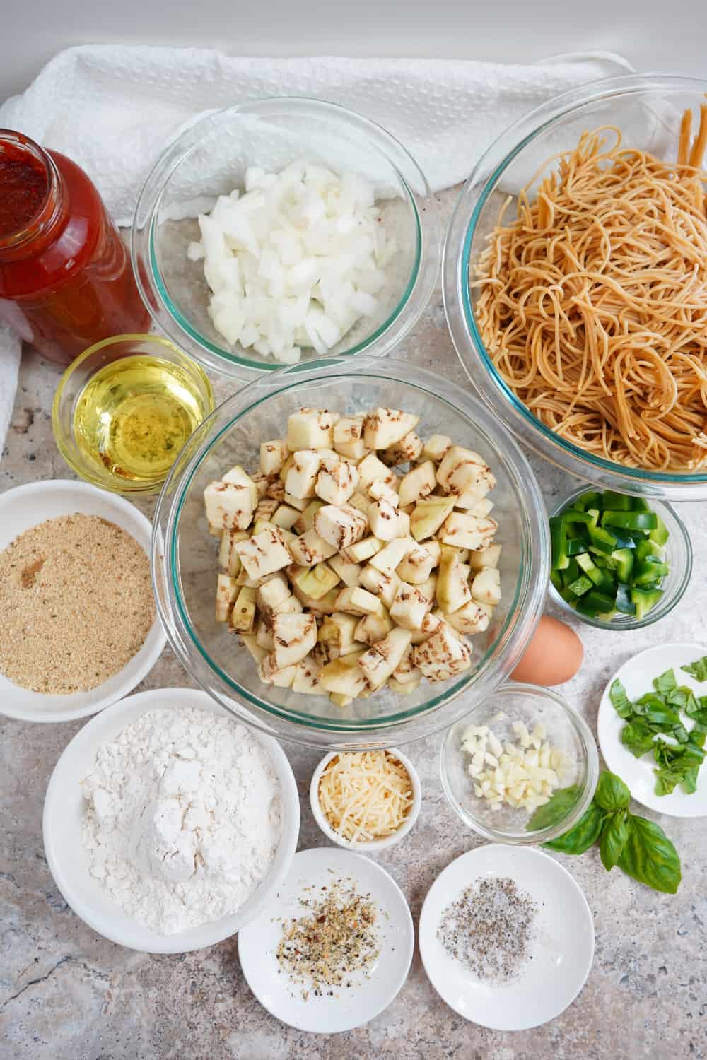 Air Fried Eggplant Pasta Ingredients Air Fried Eggplant Pasta Ingredients: whole wheat pasta, basil, garlic, spices, parmesan cheese, onion, and olive oil.