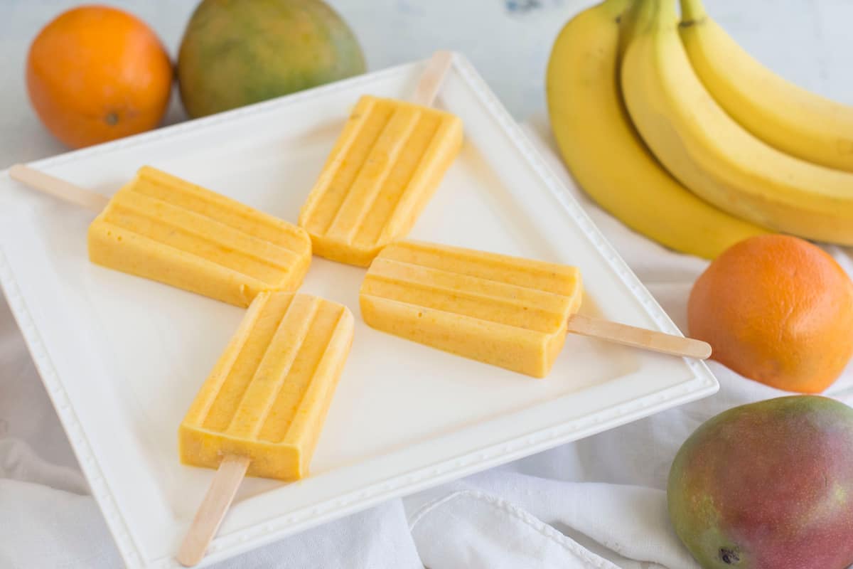 Four Orange, Mango & Banana Smoothie Popsicles.