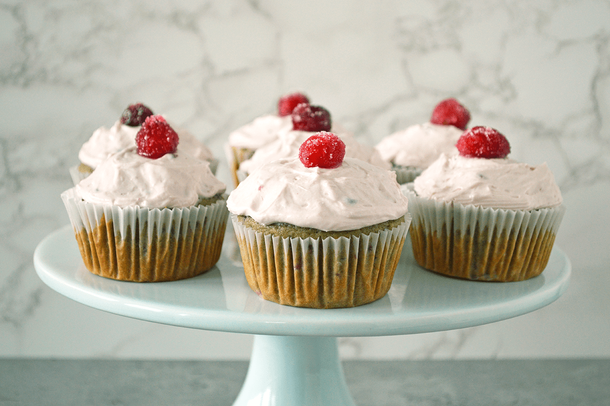 Cranberry cupcakes on cake stand.